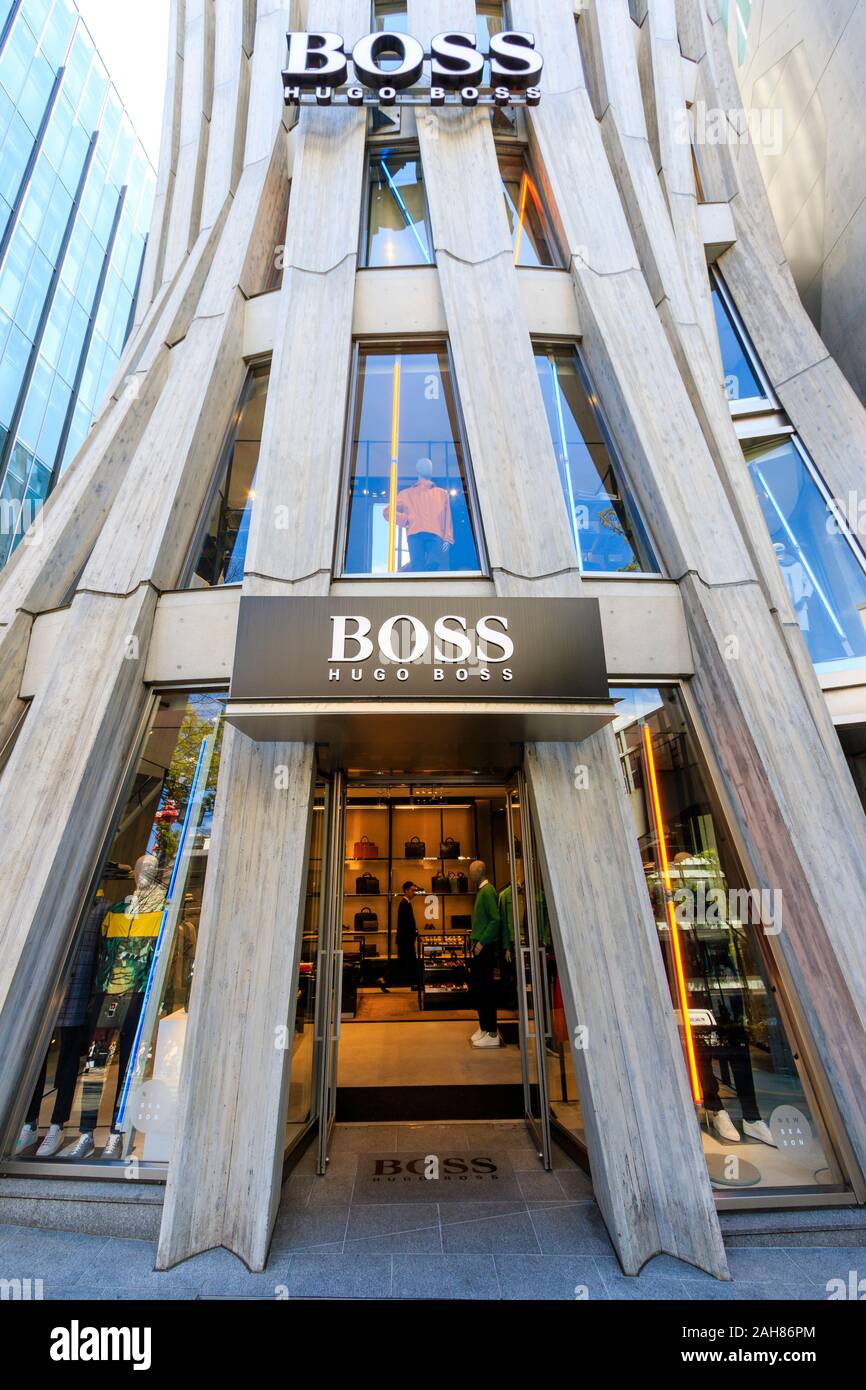 Hugo Boss flagship store in Omotesando, Tokyo. Designer Norihiko Dan.  Multiple leaf-shaped columns made from reinforced concrete. Entrance,  daytime Stock Photo - Alamy