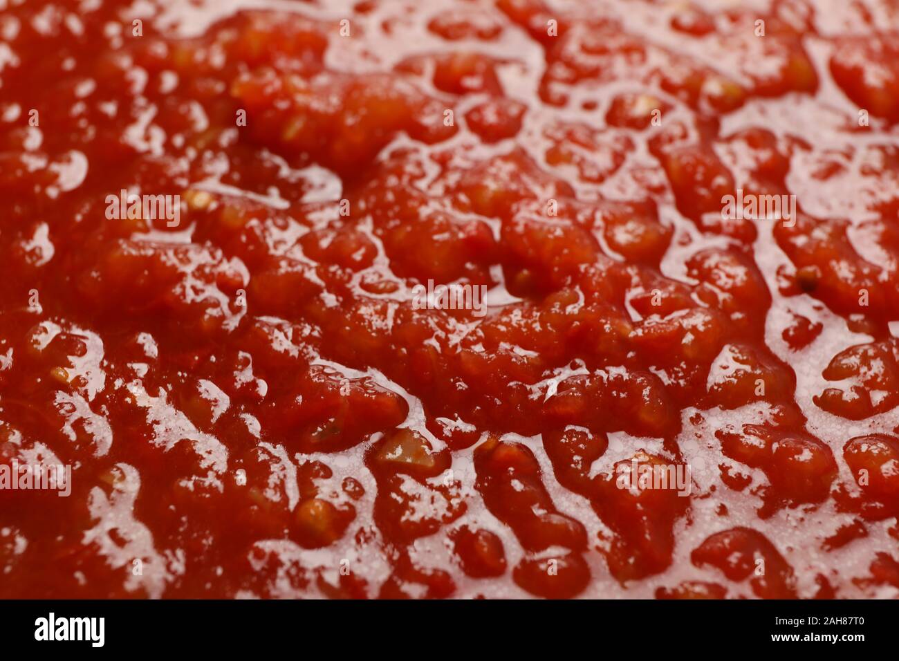 Chili sauce textured background, top view, closeup. Space for text Stock Photo