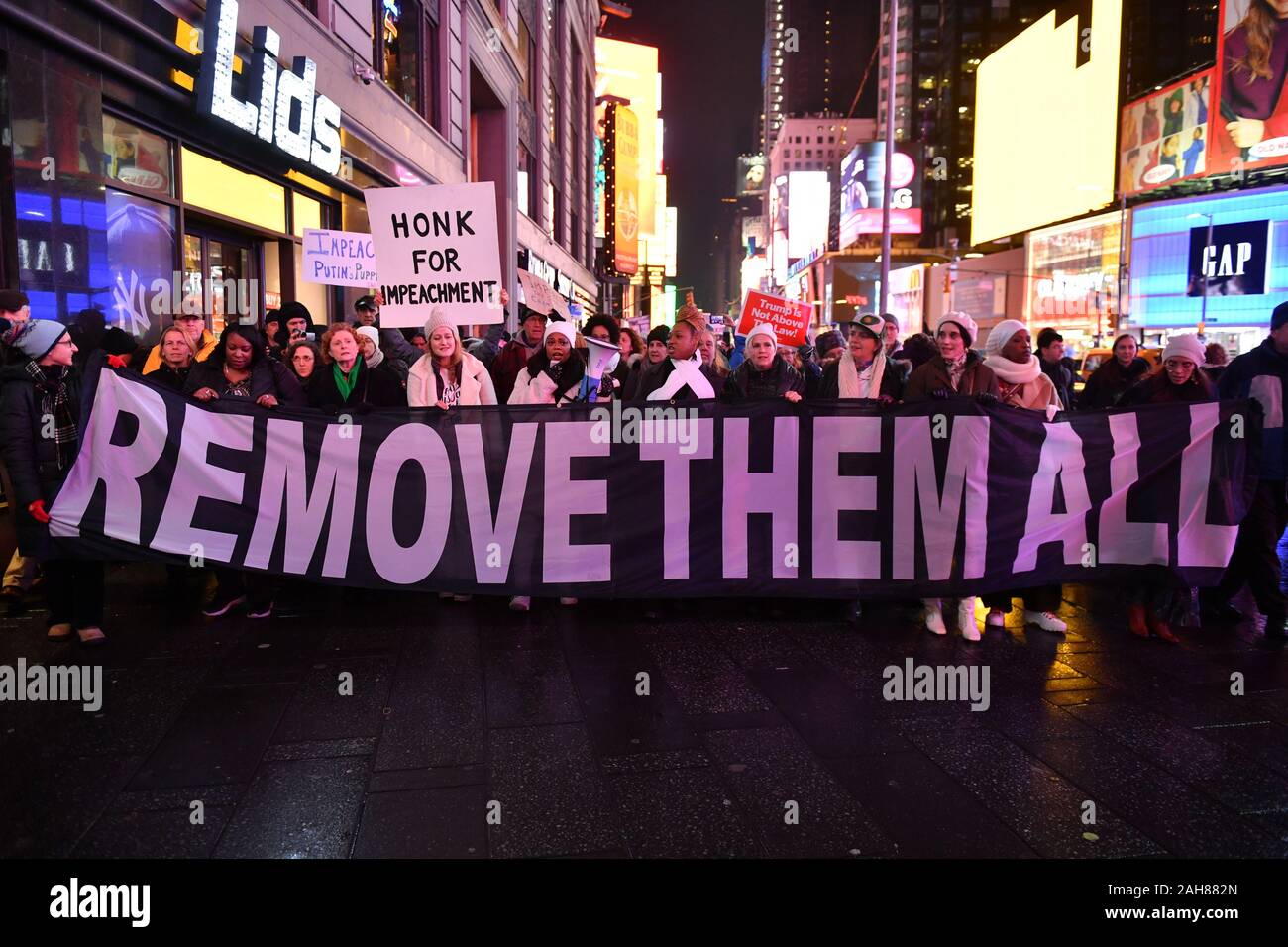 The New York City Coalition to Impeach and Remove join national demonstrations to demand an end to Donald Trump's presidency on December 17, 2019 in T Stock Photo