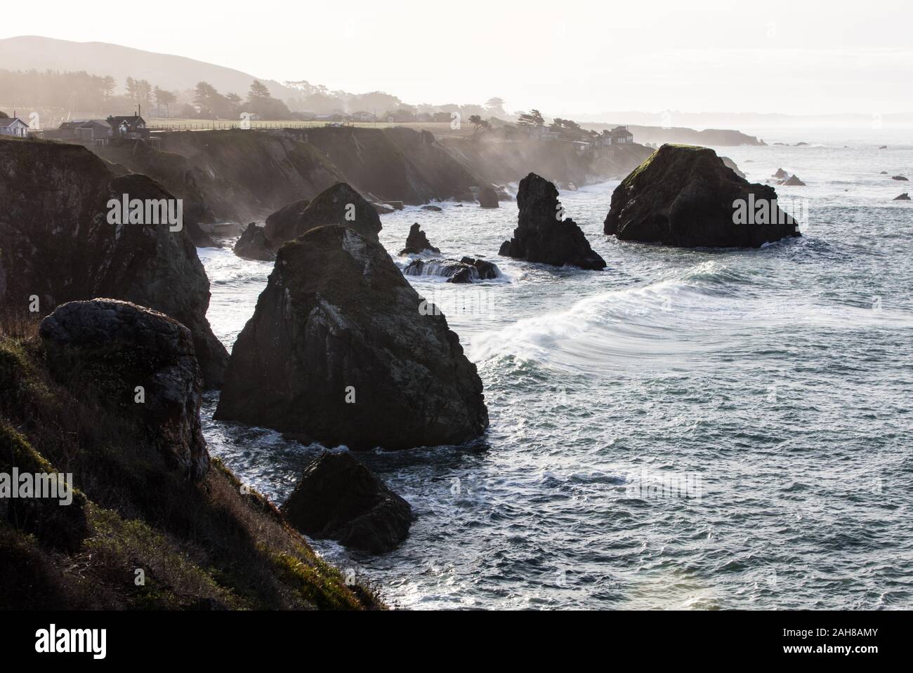 The Pacific Ocean washes against the rocky coastline of northern ...