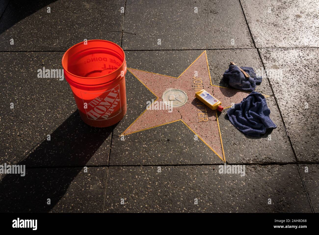Star on the Hollywood Walk of Fame in the process of cleaning, in late afternoon light (star honors John Ritter). Stock Photo