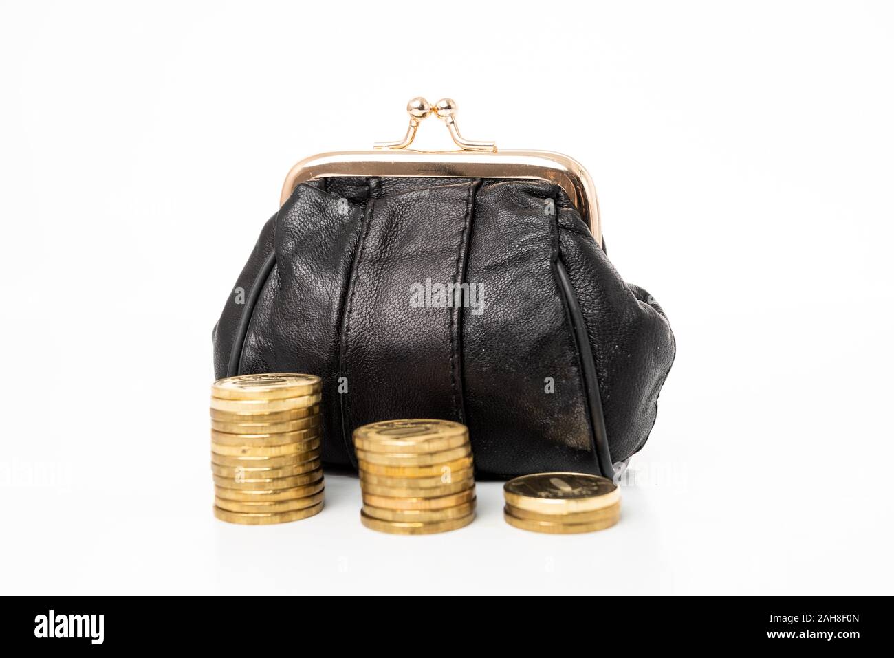 Wallet and coins isolated on white background Stock Photo - Alamy