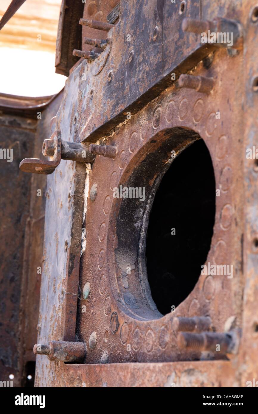 The Firebox in an Old Steam Train at the abandoned Humberstone Saltpeter factory in the Atacama Desert, Northern Chile Stock Photo