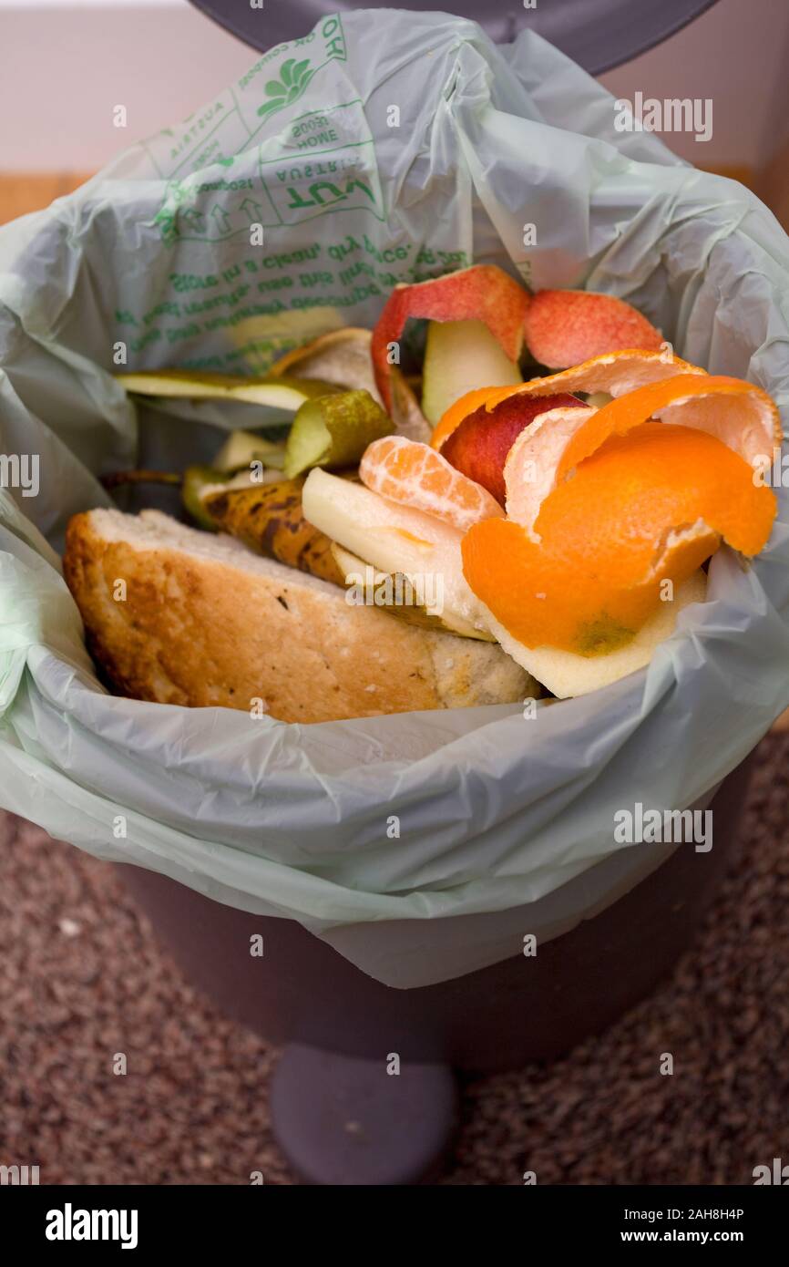 Open food waste bin with contents Stock Photo