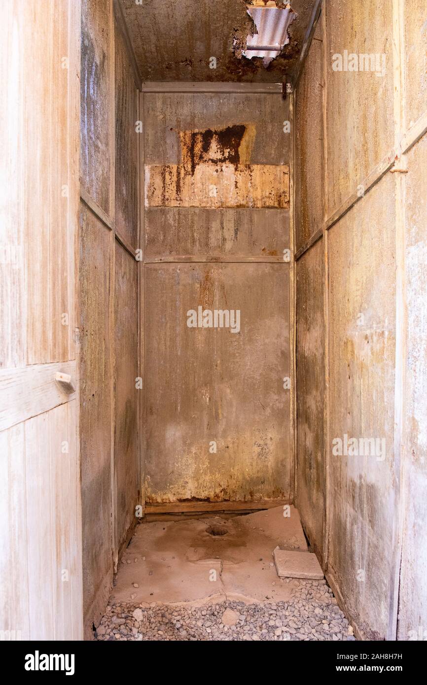 One of the toilet rooms at the abandoned Humberstone Saltpeter factory in the Atacama Desert, Northern Chile Stock Photo