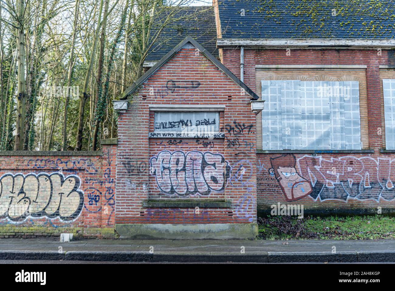 Doel Belgium December 24 2019 Abandoned village Doel in Belgium as a ghost town taken over by grafity street art near the the nuclear power plant Stock Photo