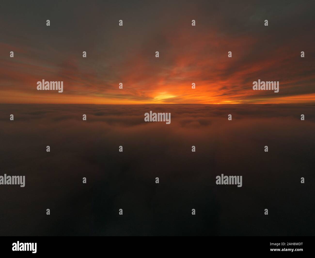 Beautiful sunrise cloudy sky from aerial view. Airplane view above ...