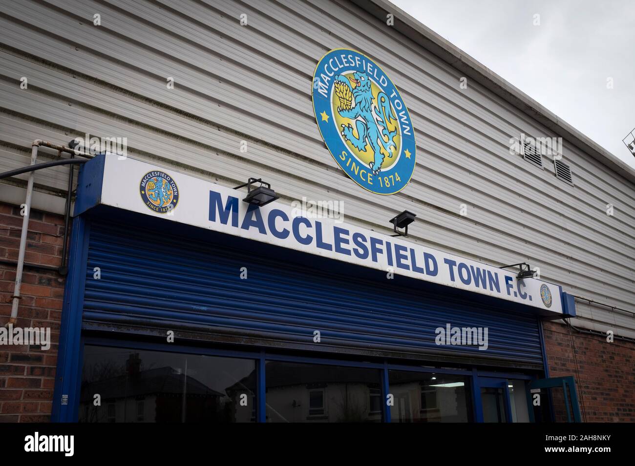 An exterior view of the ground before Macclesfield Town played Grimsby Town in a SkyBet League 2 fixture at Moss Rose. The home club had suffered problems in the run up to this fixture with the EFL deducting points after they failed to pay staff and they had a game postponed. This match ended in a 1-1 draw, watched by a crowd of 1,991. Stock Photo