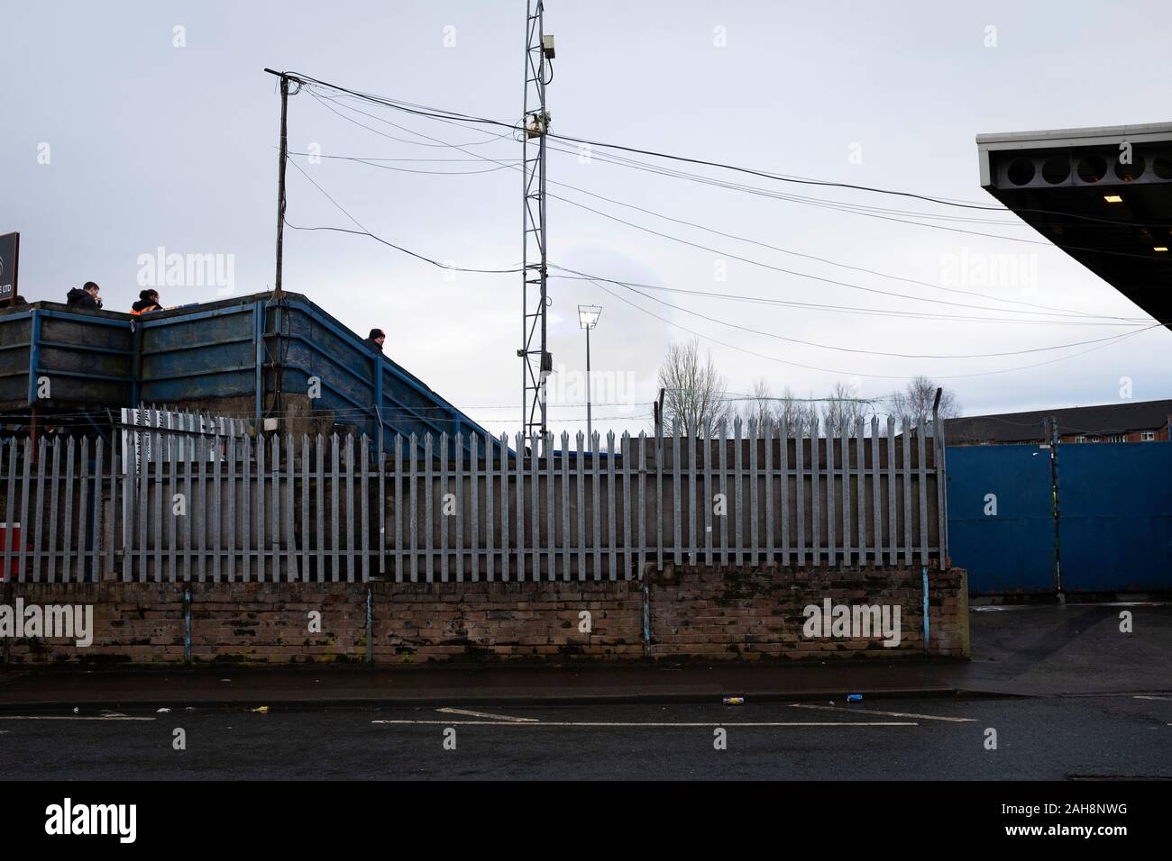 An exterior view of the ground before Macclesfield Town played Grimsby Town in a SkyBet League 2 fixture at Moss Rose. The home club had suffered problems in the run up to this fixture with the EFL deducting points after they failed to pay staff and they had a game postponed. This match ended in a 1-1 draw, watched by a crowd of 1,991. Stock Photo