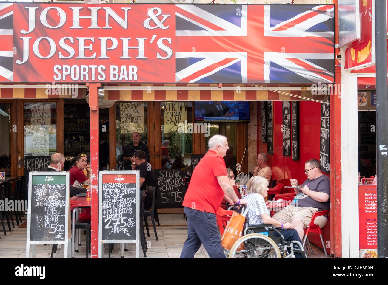 Benidorm, Spain, street view of british bars and signage in the new