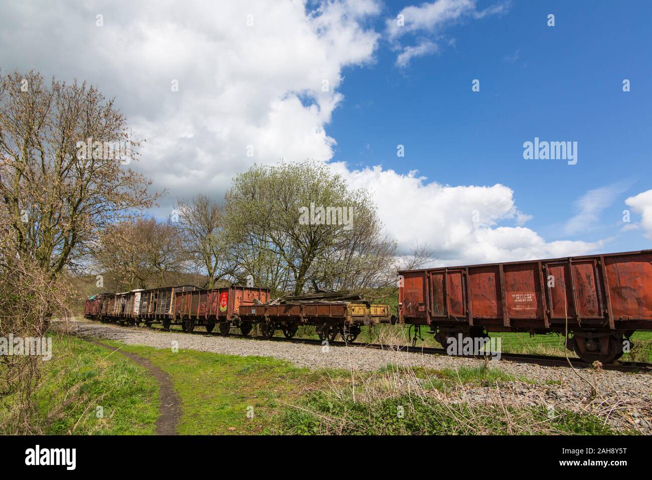 Vintage abandoned railway wagons at closed railway station in Belgium Stock Photo