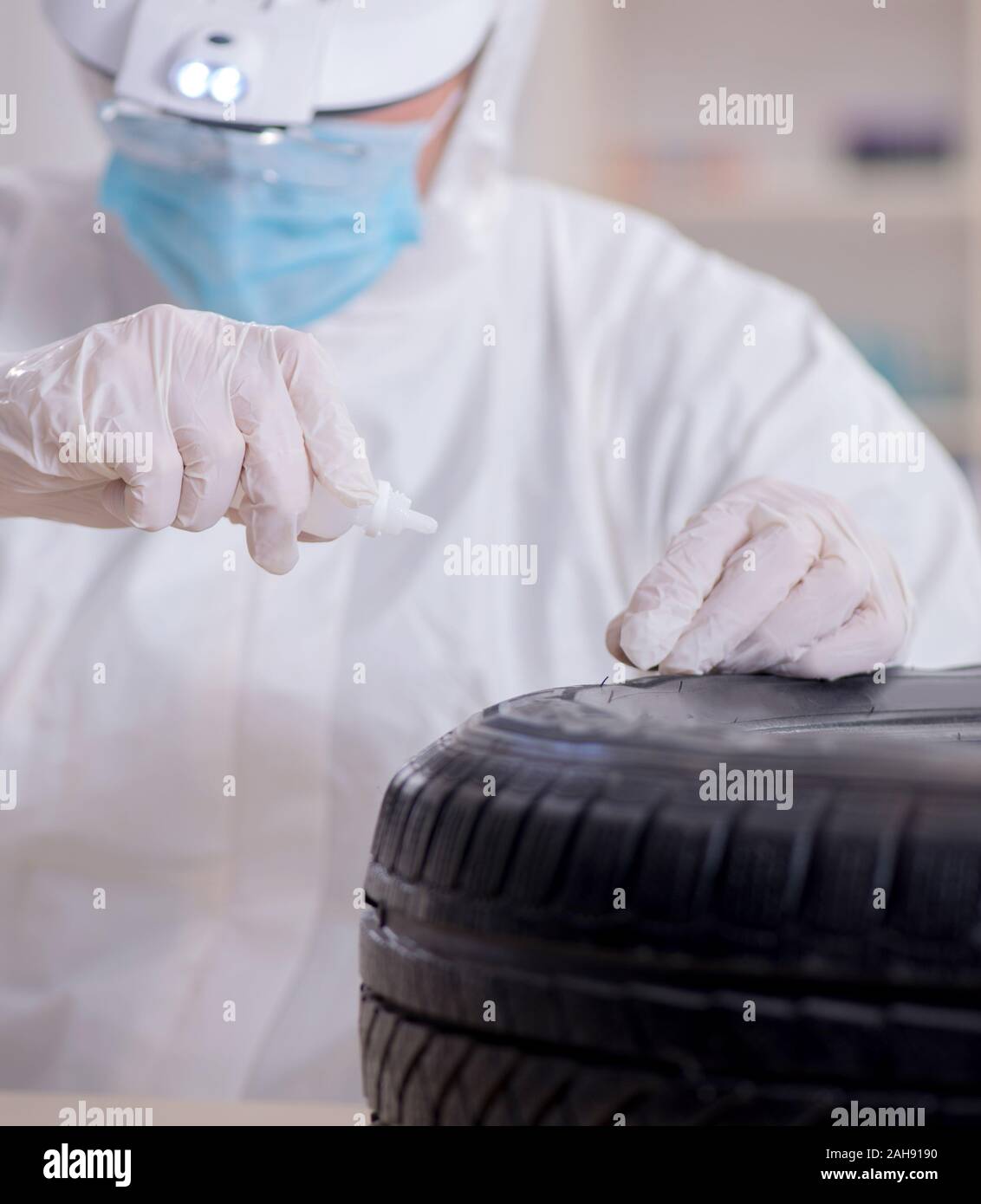 The expert is looking at car accident evidence Stock Photo Alamy