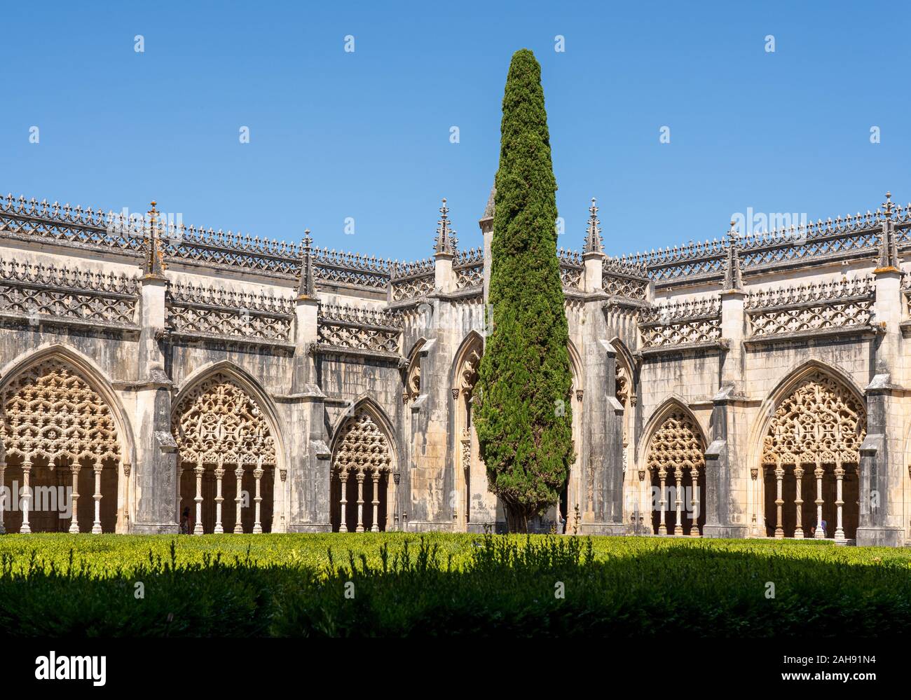 Leiria, Portugal - 20 August 2019: Ornate arches around the cloisters at the Batalha Monastery near Leiria in Portugal Stock Photo