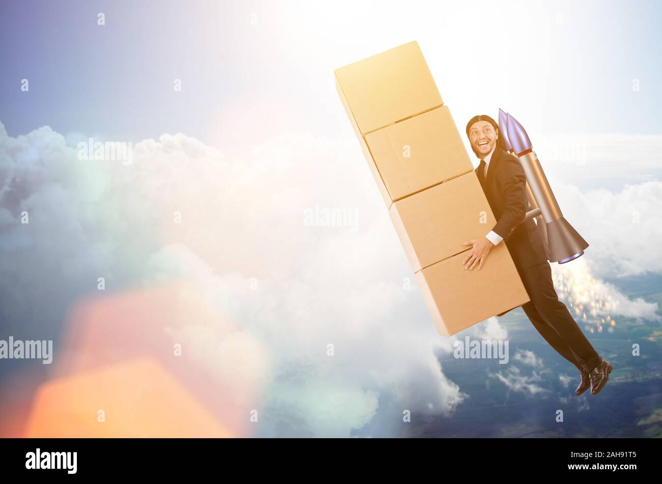 The businessman with jetpack delivering boxes globally Stock Photo - Alamy