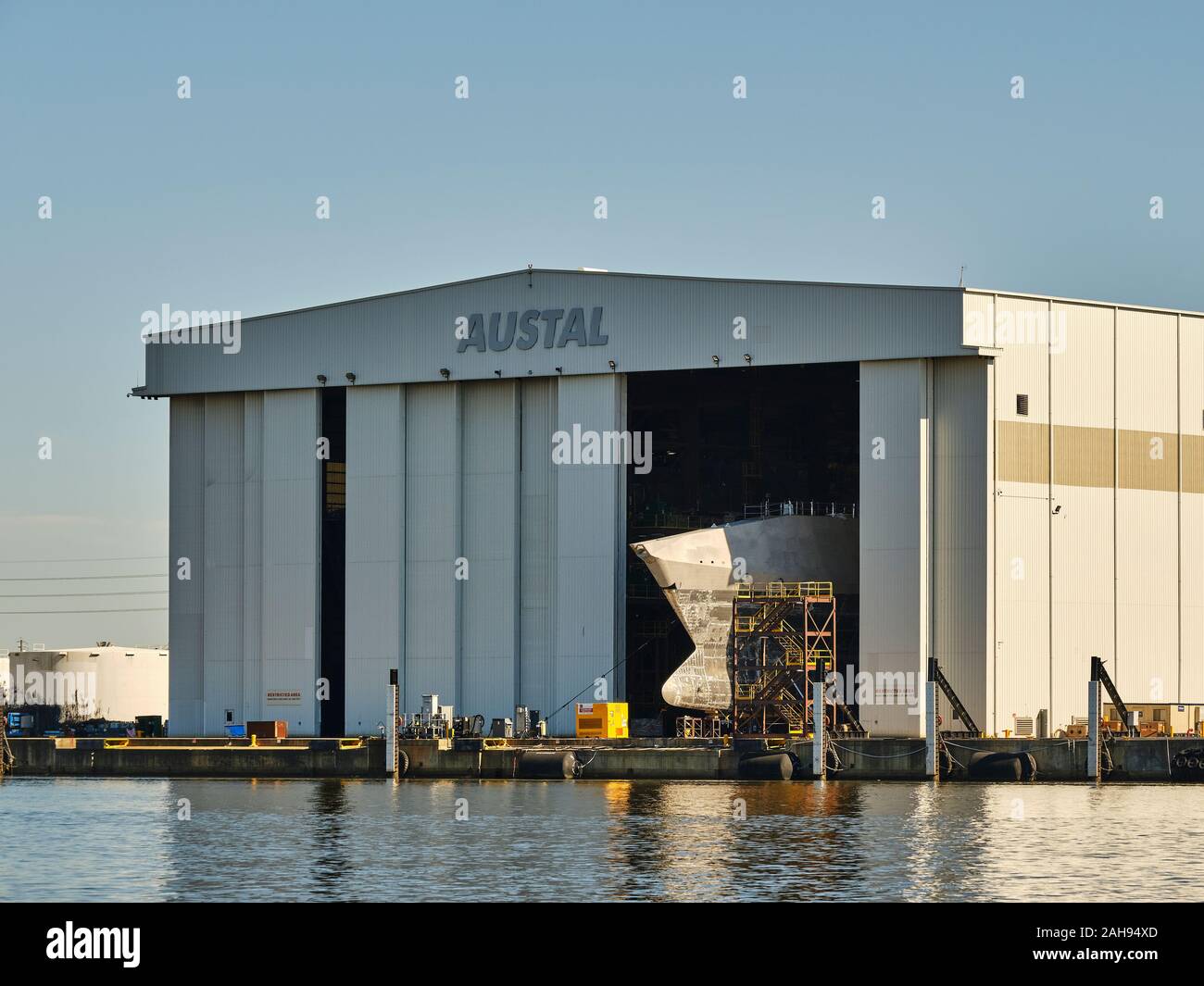 US Navy littoral ships being built in the Austal ship building yard  on the Mobile River in Mobile bay, Mobile Alabama. Stock Photo