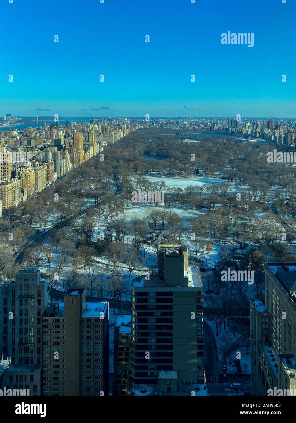 Aerial view of New York City looking from Midtown Manhattan unto ...