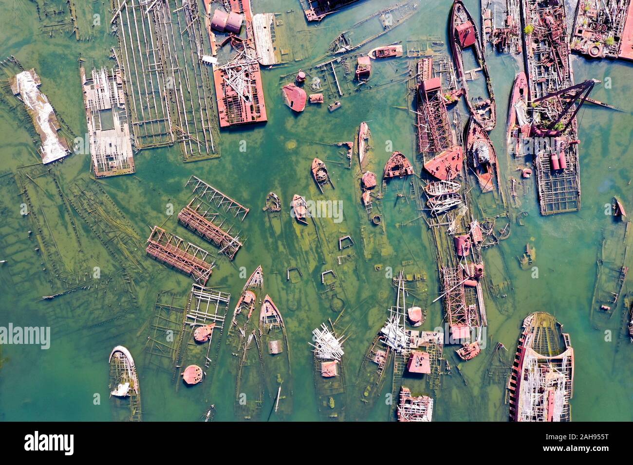 An aerial view from above of abandoned ships at Arthur Kill Boat Graveyard in Staten Island, New York. Stock Photo