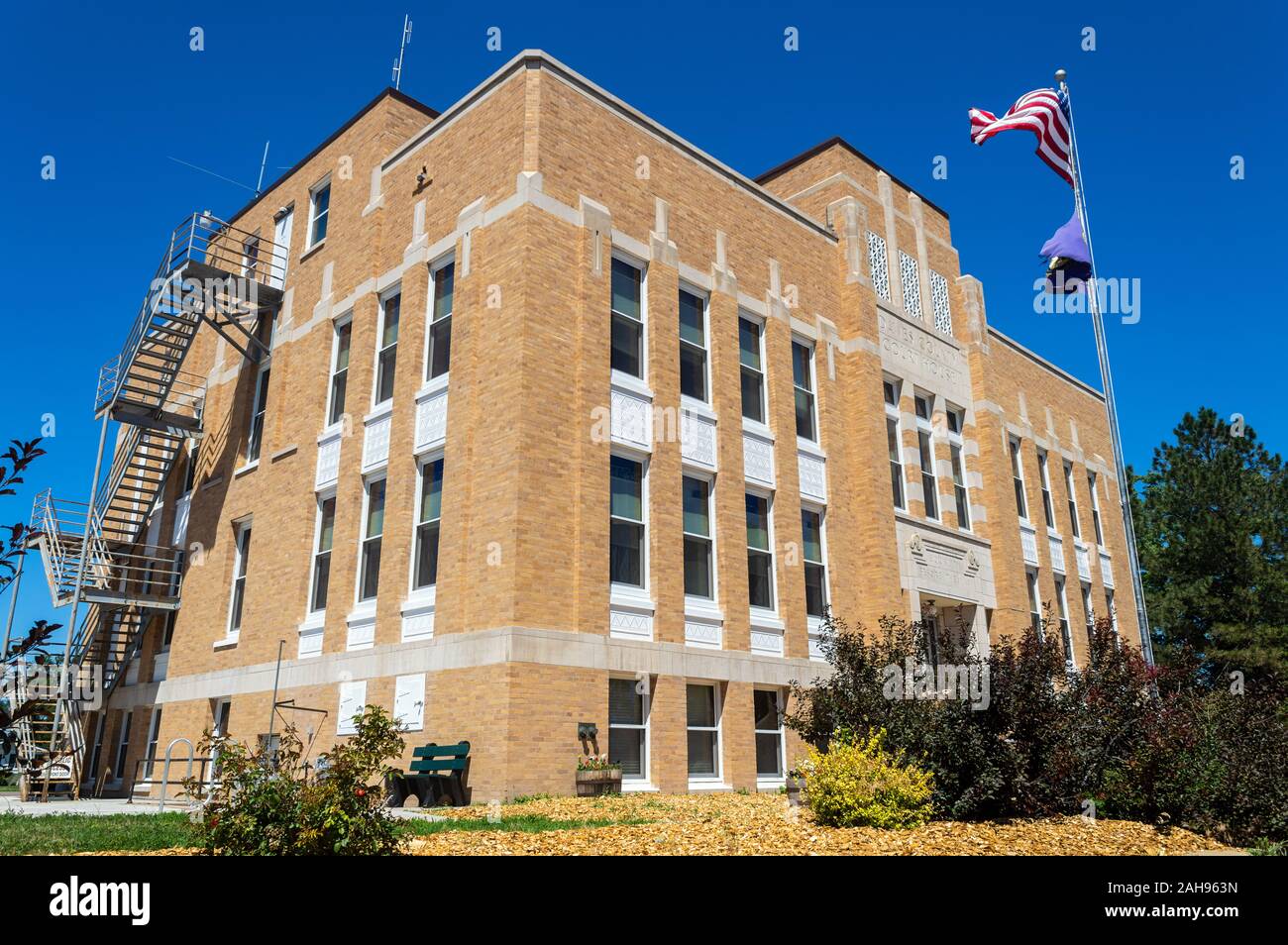 Chadron, Nebraska - July 25, 2014: The Flag Flies in Front of the Dawes County Courthouse Stock Photo