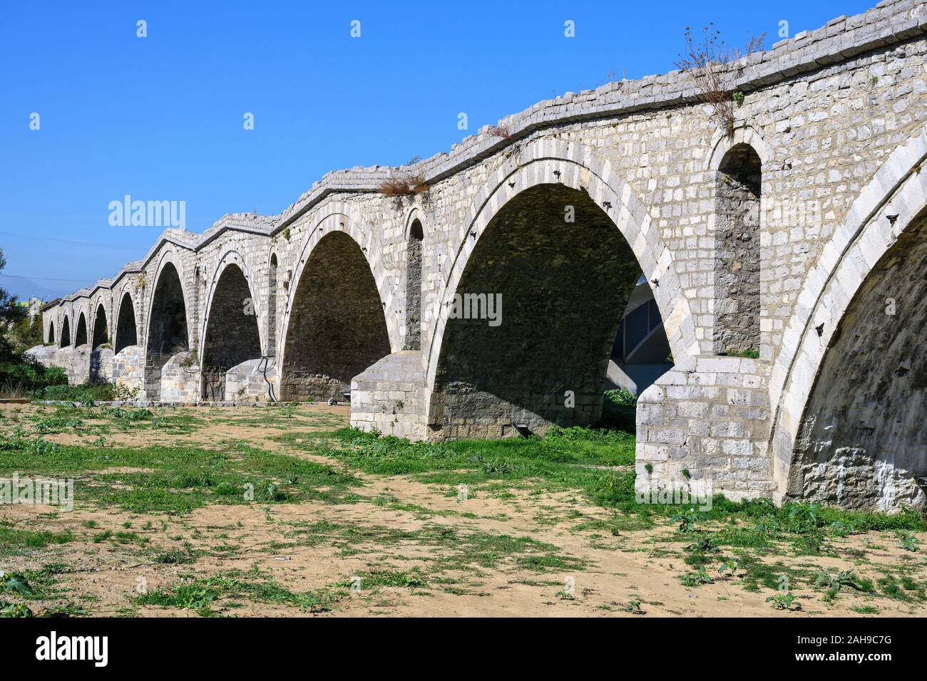 The Terzijski bridge, Tailors bridge, an 15 cen. Ottoman stone bridge near the village of Bistražin near Gjakova, Đakovica, in the Republic of Kosovo, Stock Photo