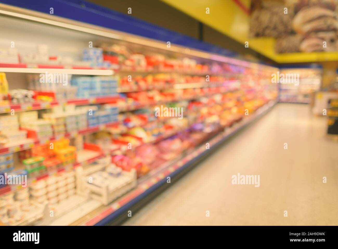 Defocused View Of Goods Inside Supermarket Stock Photo