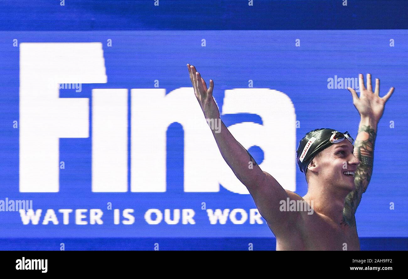 Beijing, China. 26th July, 2019. File photo taken on July 26, 2019 shows Caeleb Dressel of the United States celebrating after the men's 100m butterfly semifinal at the Gwangju 2019 FINA World Championships in Gwangju, South Korea. Dressel grabbed a record eight medals, including six golds, at the 2019 World Aquatics Championships in Gwangju, South Korea. During the competition, he also broke the world record in the men's 100m butterfly set by compatriot Michael Phelps in August 2009. Credit: Xia Yifang/Xinhua/Alamy Live News Stock Photo