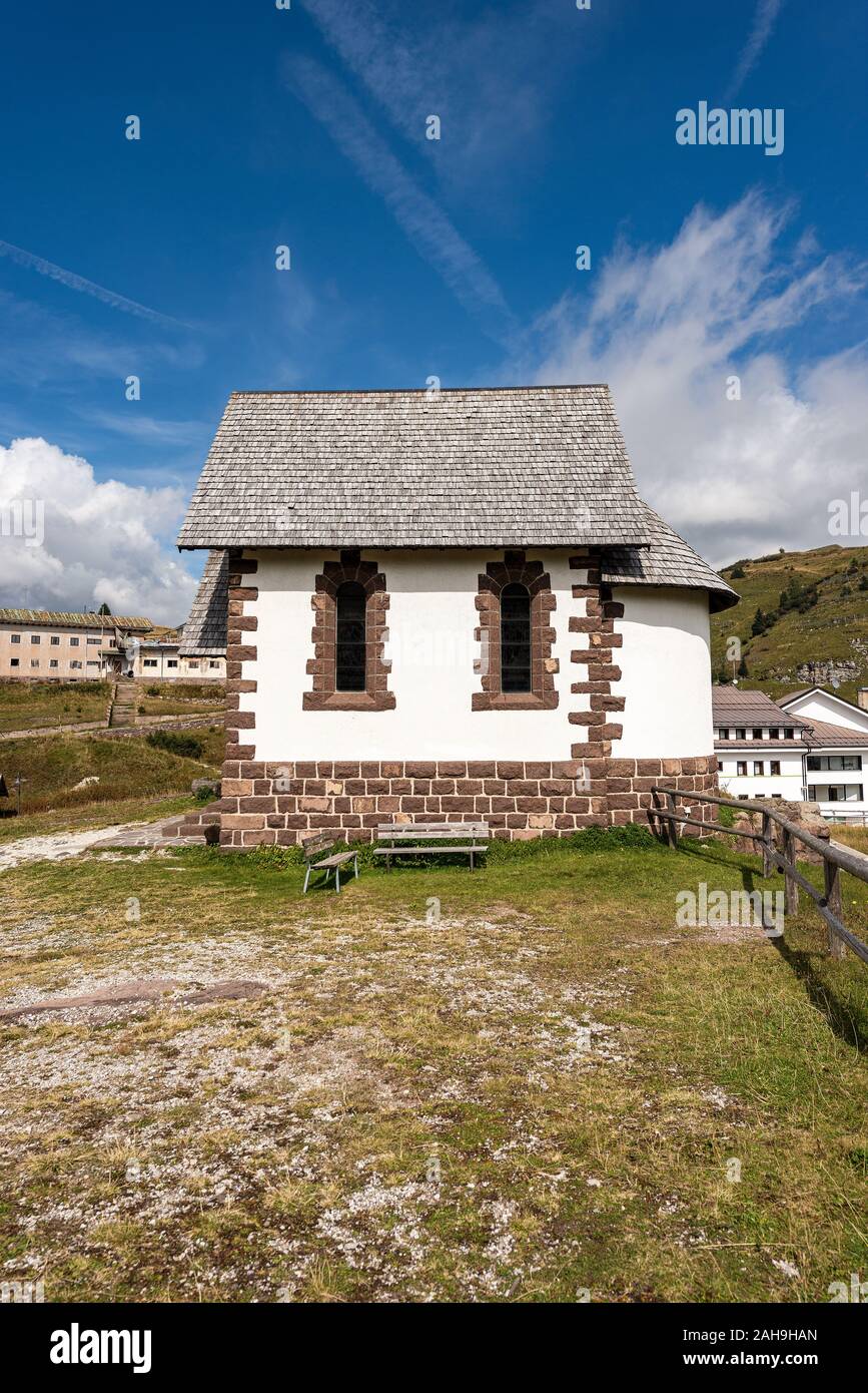 Small church with wooden roof in mountain, Passo Rolle, Fiera di Primiero, Dolomites, Italian Alps, Trentino Alto Adige, Italy, Europe Stock Photo