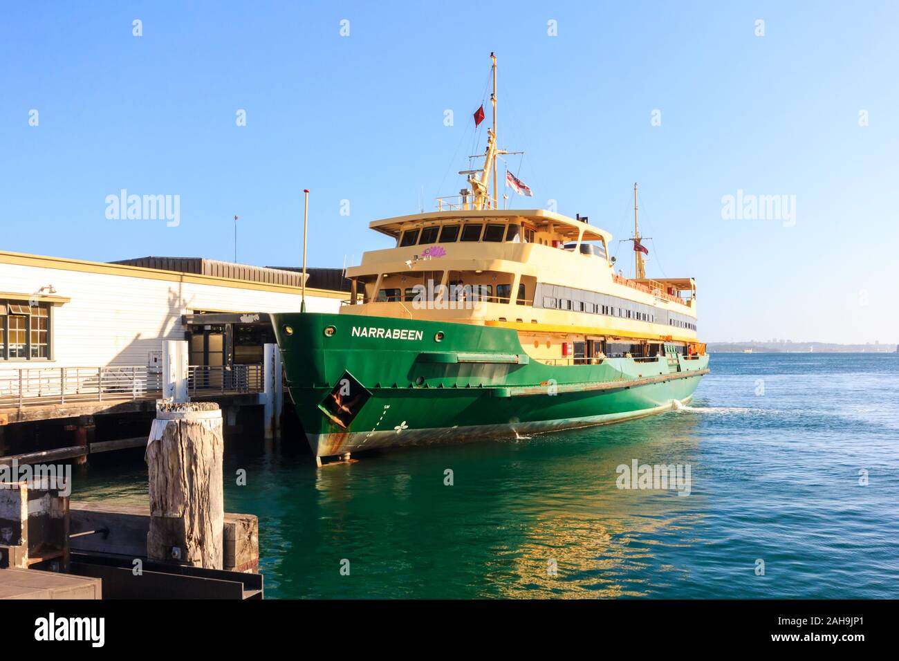 Sydney, Australia - December 30th 2013: The Manly ferry moored at Manly pier. The service runs to Circular Quay in central Sydney. Stock Photo