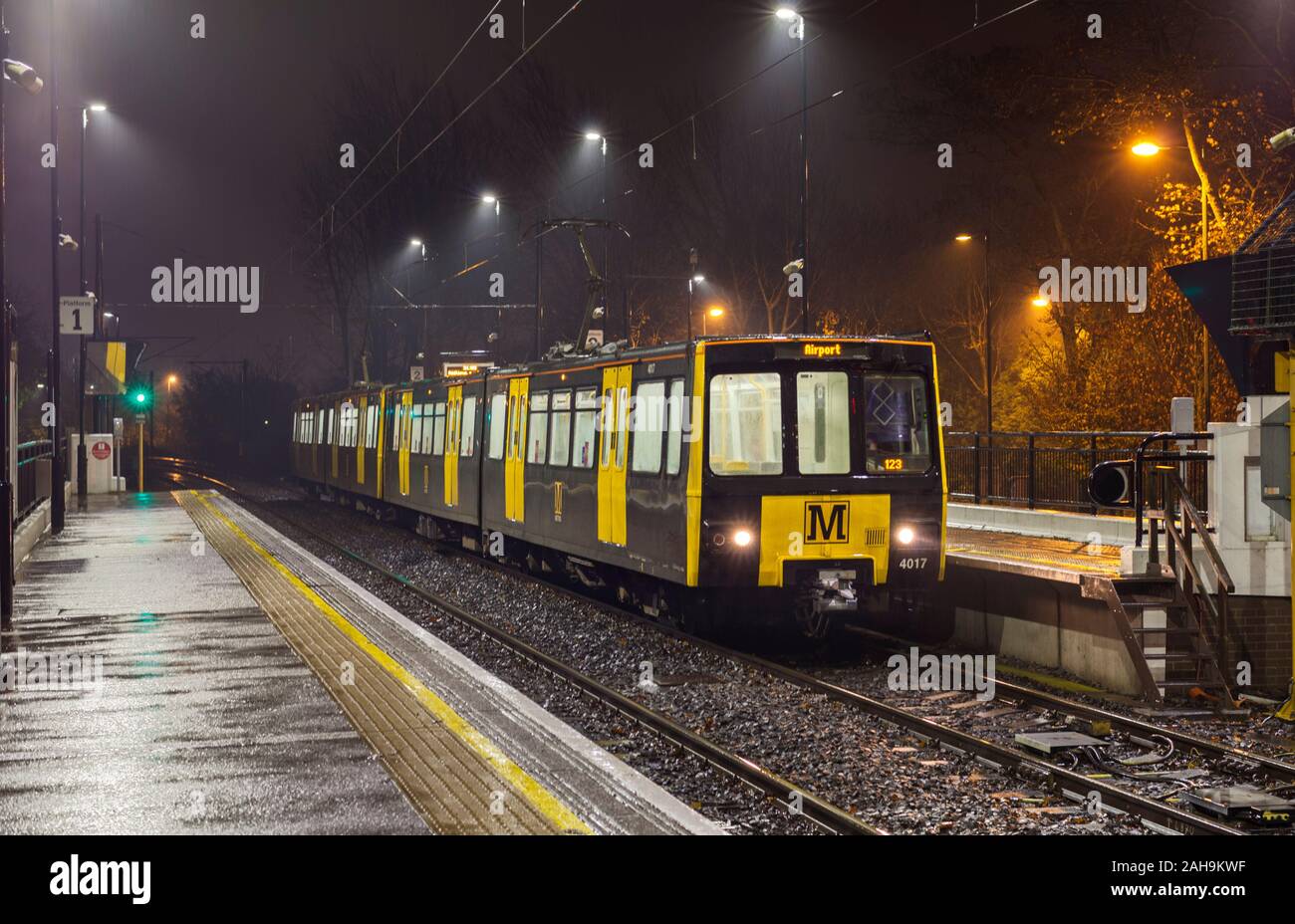 Nexus Tyne and wear Metro cars 4017 + 4054 at Bank Foot  station on a dark wet night Stock Photo
