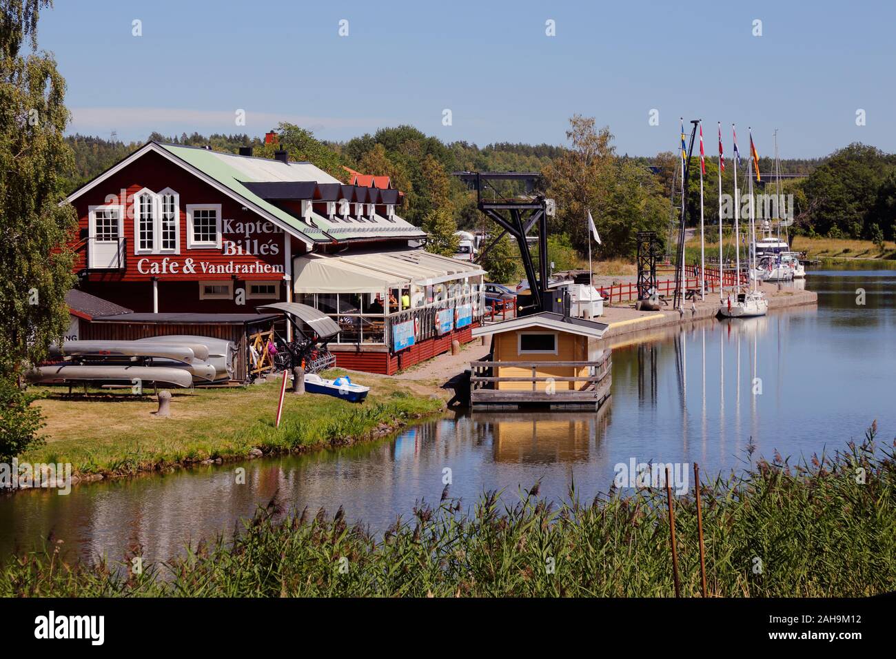 Norsholm, Sweden - July 5, 2018: View of the Kapten Billes uouth hostel and cafe at the Gota canal. Stock Photo