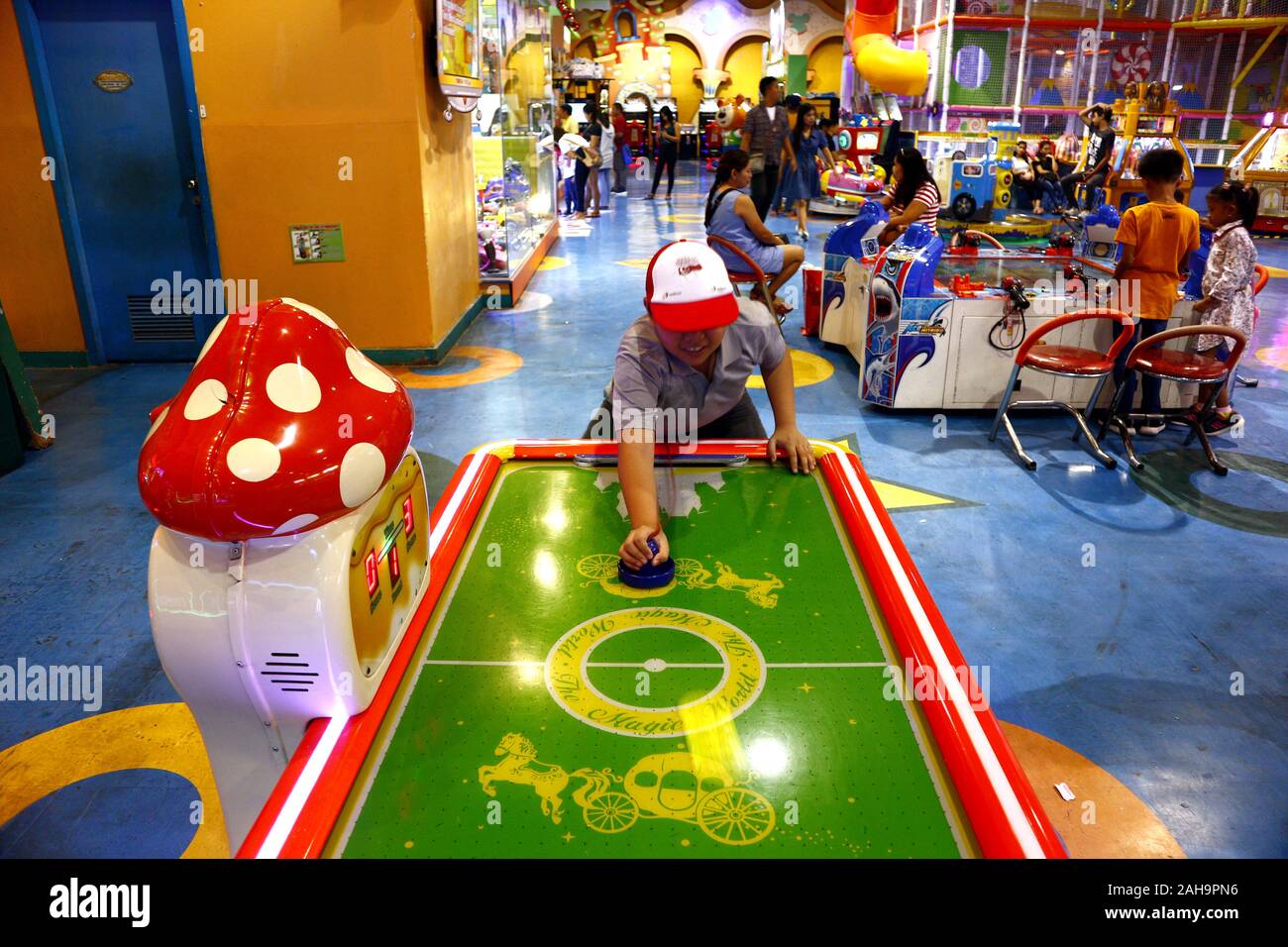 Quezon City, Philippines December 22, 2019 Customers play video