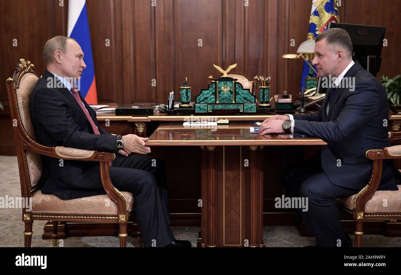 December 27, 2019. - Russia, Moscow. - Russian President Vladimir Putin (left) and Russian Emergency Situations Minister Evgeny Zinichev during a meeting at Moscow's Kremlin on Emergency Rescuer's Day. Stock Photo