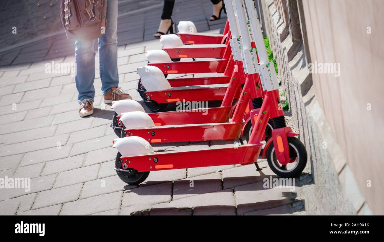 April 26, 2019. Krakow, Poland. Electric scooters parked on city street