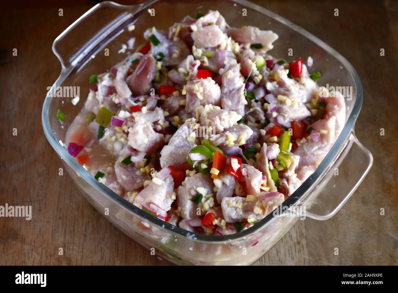 Photo of a bowl of freshly made kinilaw na tuna or raw fish salad Stock