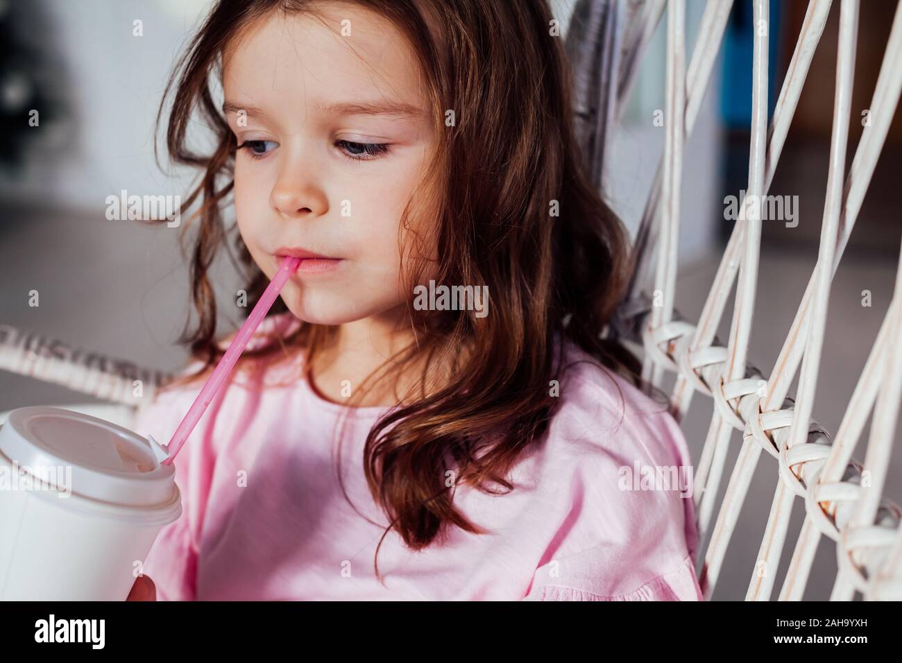 Portrait of a beautiful little girl in a pink dress five years Stock ...