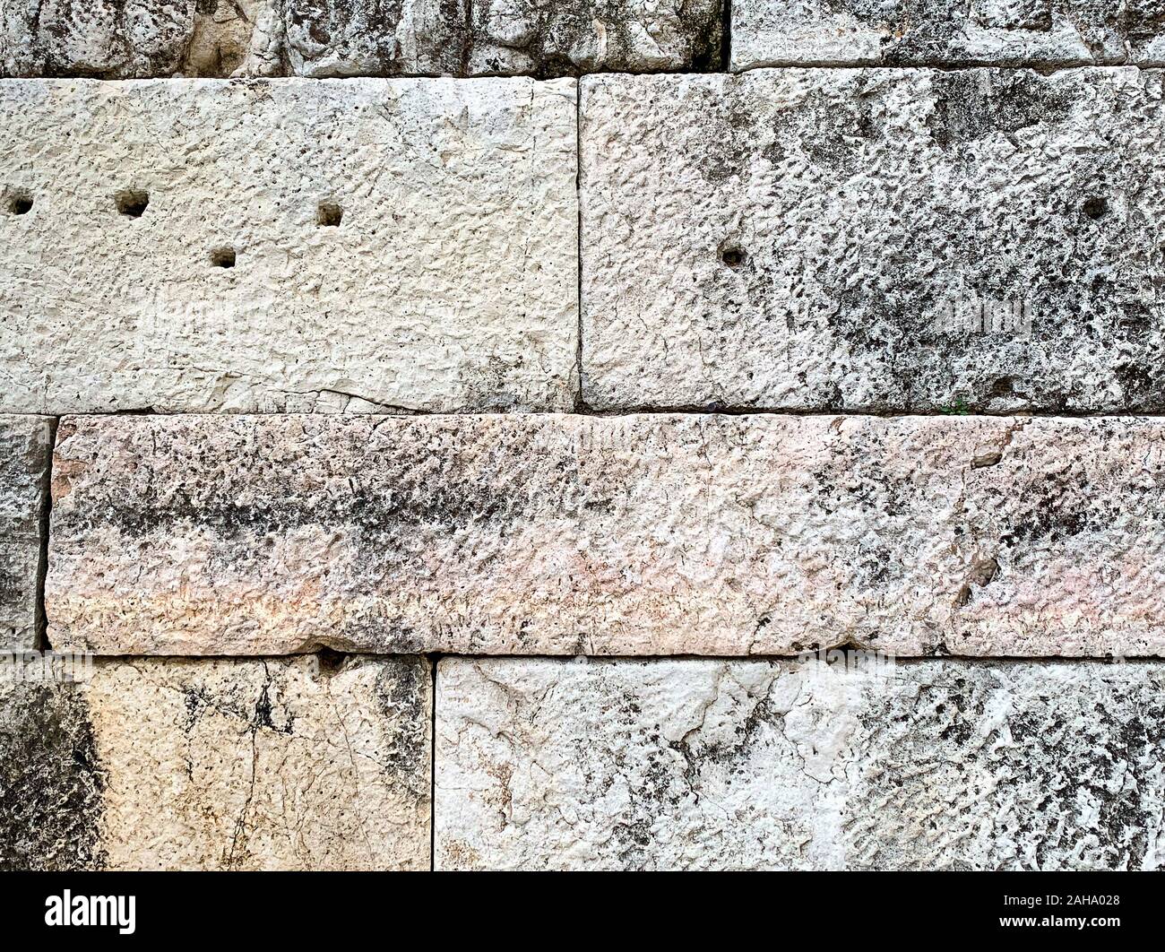 Detail of an ancient stone wall of the Acropolis, Athens, Attica region in Greece. Close-up of huge antique blocks of stone forming a wall. Stock Photo