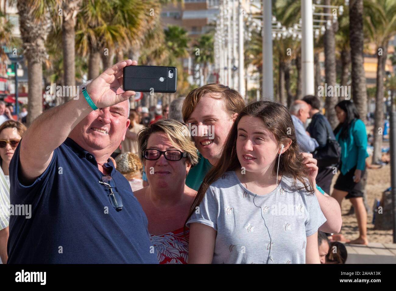 Benidorm, Alicante Province, Spain. 27th December 2019. Soaring temperatures in Spain guarantee a tan for these British tourists enjoying their break in the winter sun away from cold wet Britain. Stock Photo