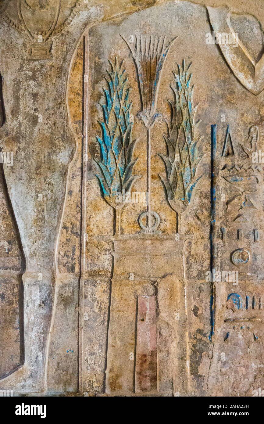 UNESCO World Heritage, Thebes in Egypt, ptolemaic temple of Deir el Medineh, devoted to Hathor. Blue lettuces of god Min, on a small temple model. Stock Photo