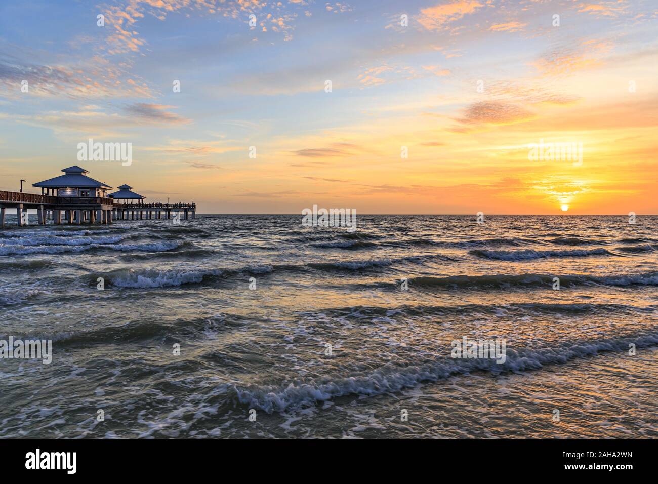 Sunset over the Gulf of Mexico in Fort Myers Beach Stock Photo