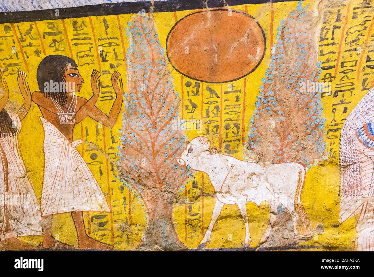 UNESCO World Heritage, Thebes in Egypt,  Deir el Medineh,  tomb of Irynefer, the dead prays before a white calf, a symbol of the young sun. Stock Photo