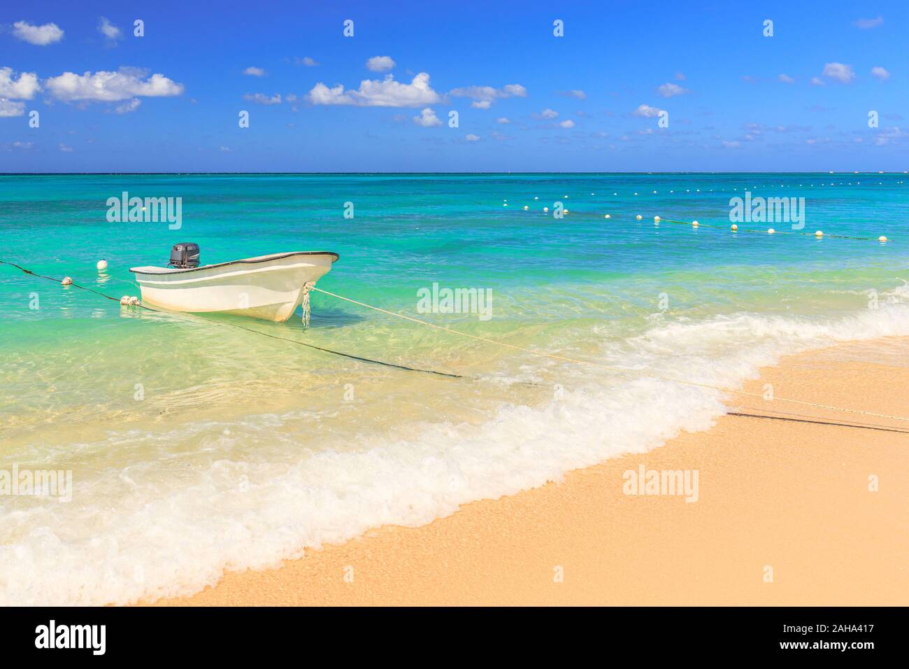 Boat on a beach in Montego Bay Jamaica Stock Photo