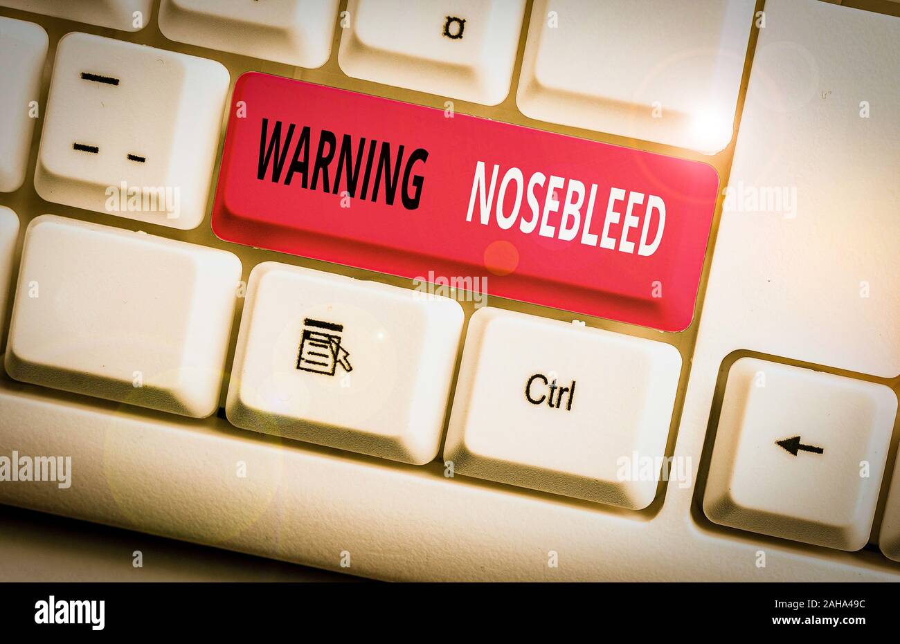 Conceptual hand writing showing Warning Nosebleed. Concept meaning caution on bleeding from the
