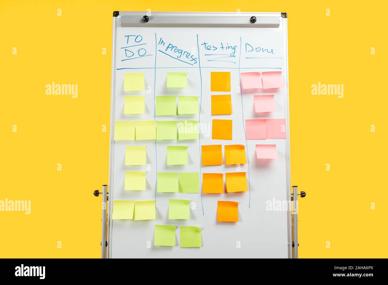 white office board with sticky notes isolated on yellow Stock Photo