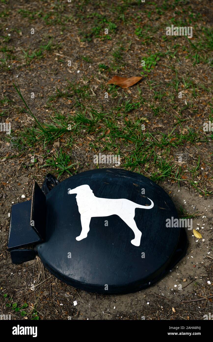 IN-GROUND DOG WASTE DISPOSAL SYSTEM,poo,feces,crap,safety,dispose,collect,collection,hazard,hazardous waste material,underground,buried receptacle,con Stock Photo