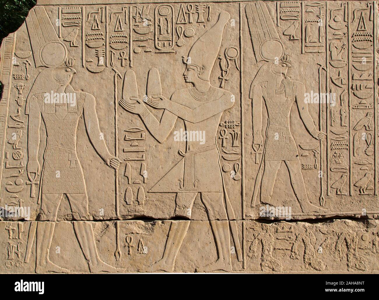 Thebes in Egypt, Karnak temple, Open Air Museum. This gate was originally at Medamud. Senusret III offers bread to the hawk-headed god Monthu. Stock Photo