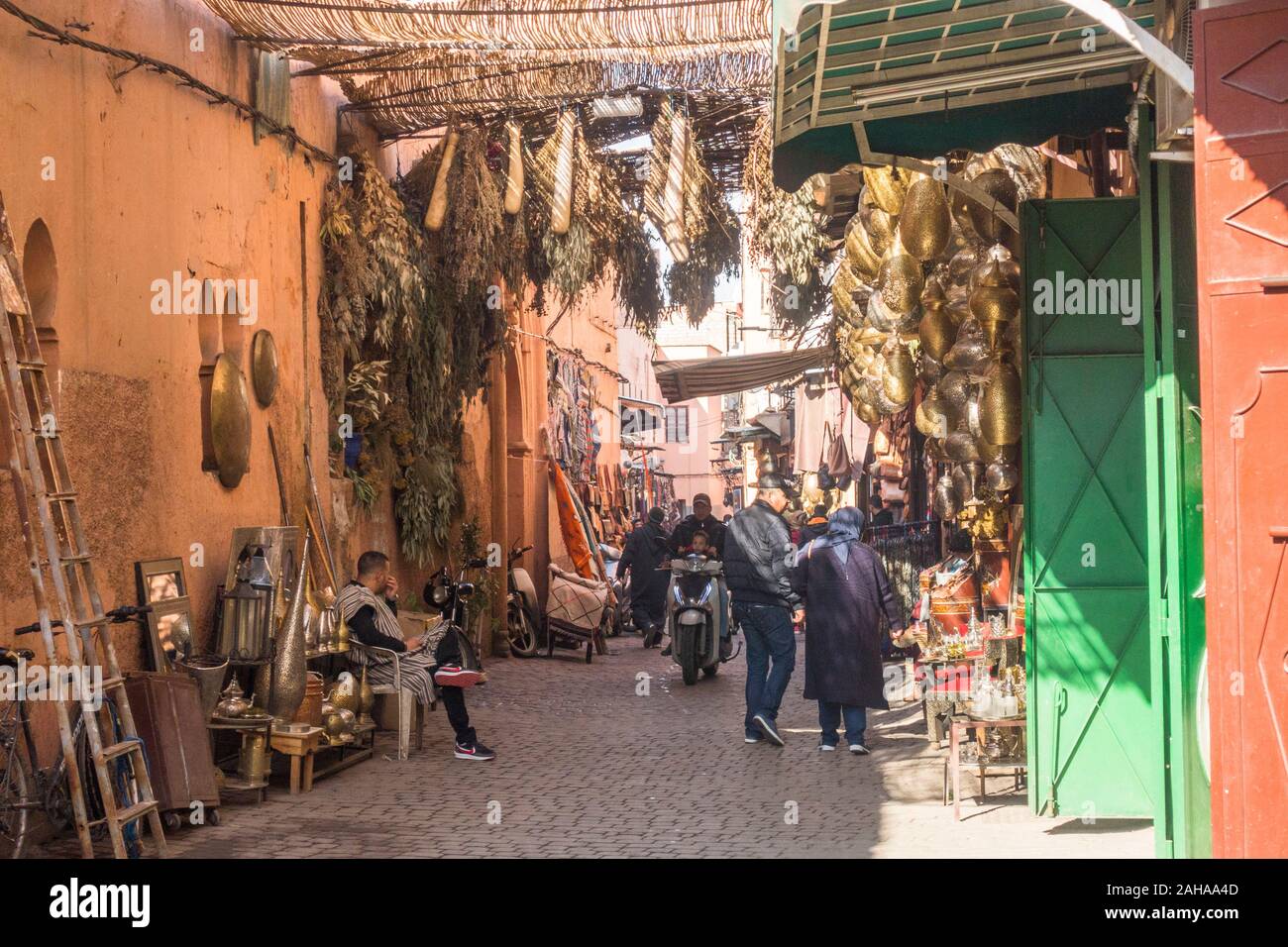 Kasbah, Marrakech,  shops displaying copper work, and herbs, Morocco, northern Africa Stock Photo