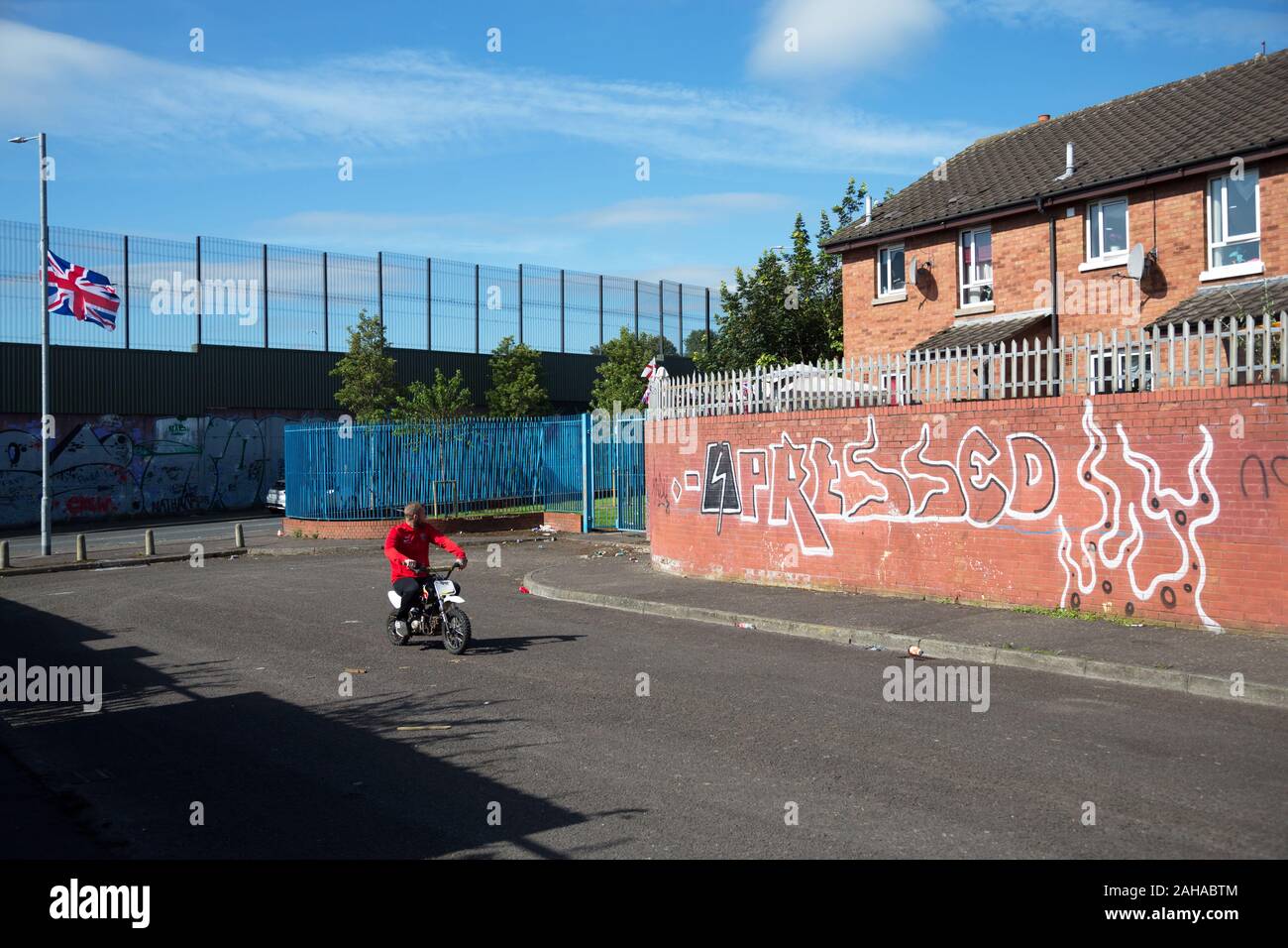 14.07.2019, Belfast, Northern Ireland, Great Britain - Protestant part of West Belfast (Conway Street), high walled housing estate, right of the Peace Stock Photo