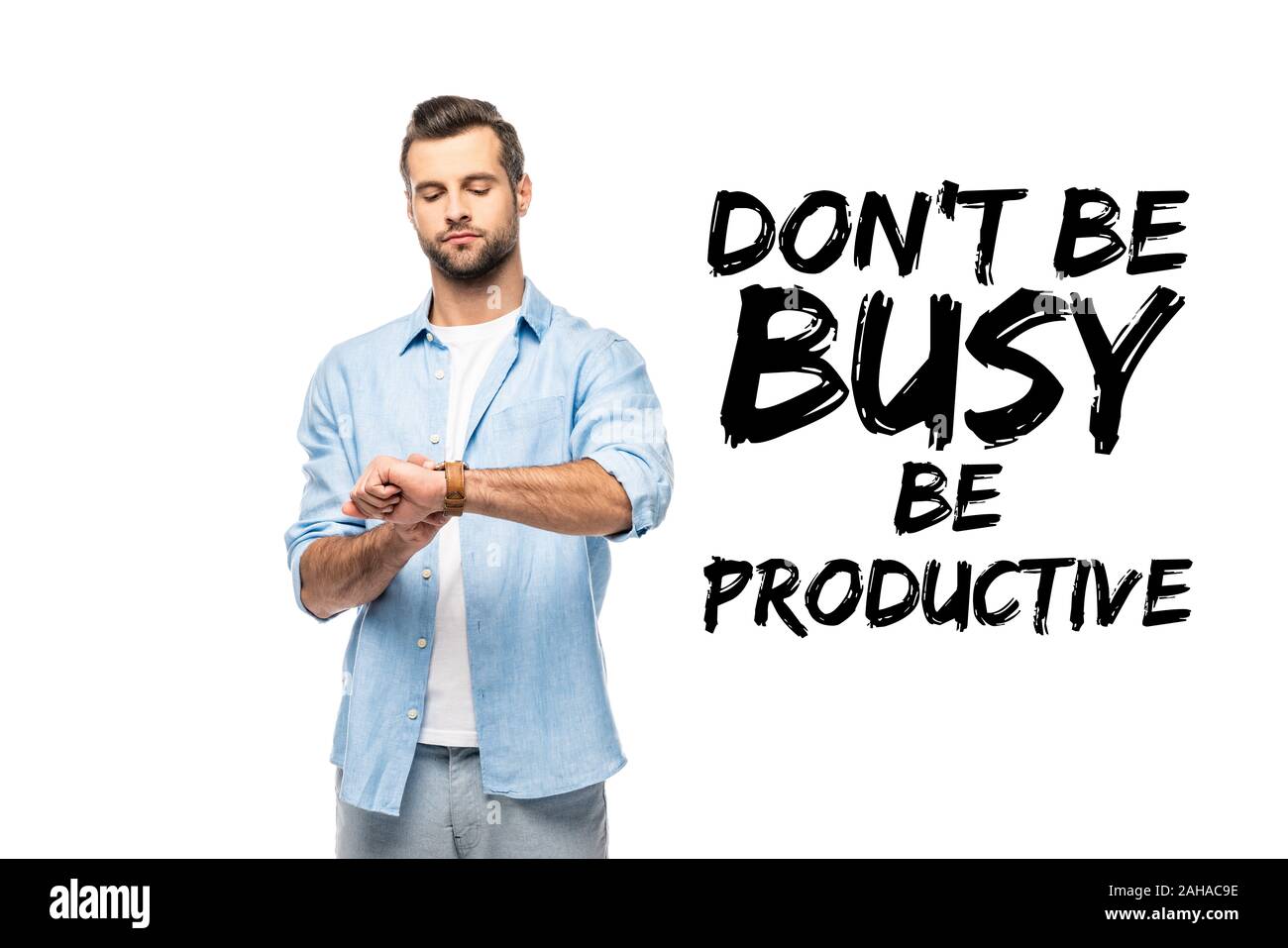 man looking at watch Isolated On White with don't be busy be productive lettering Stock Photo