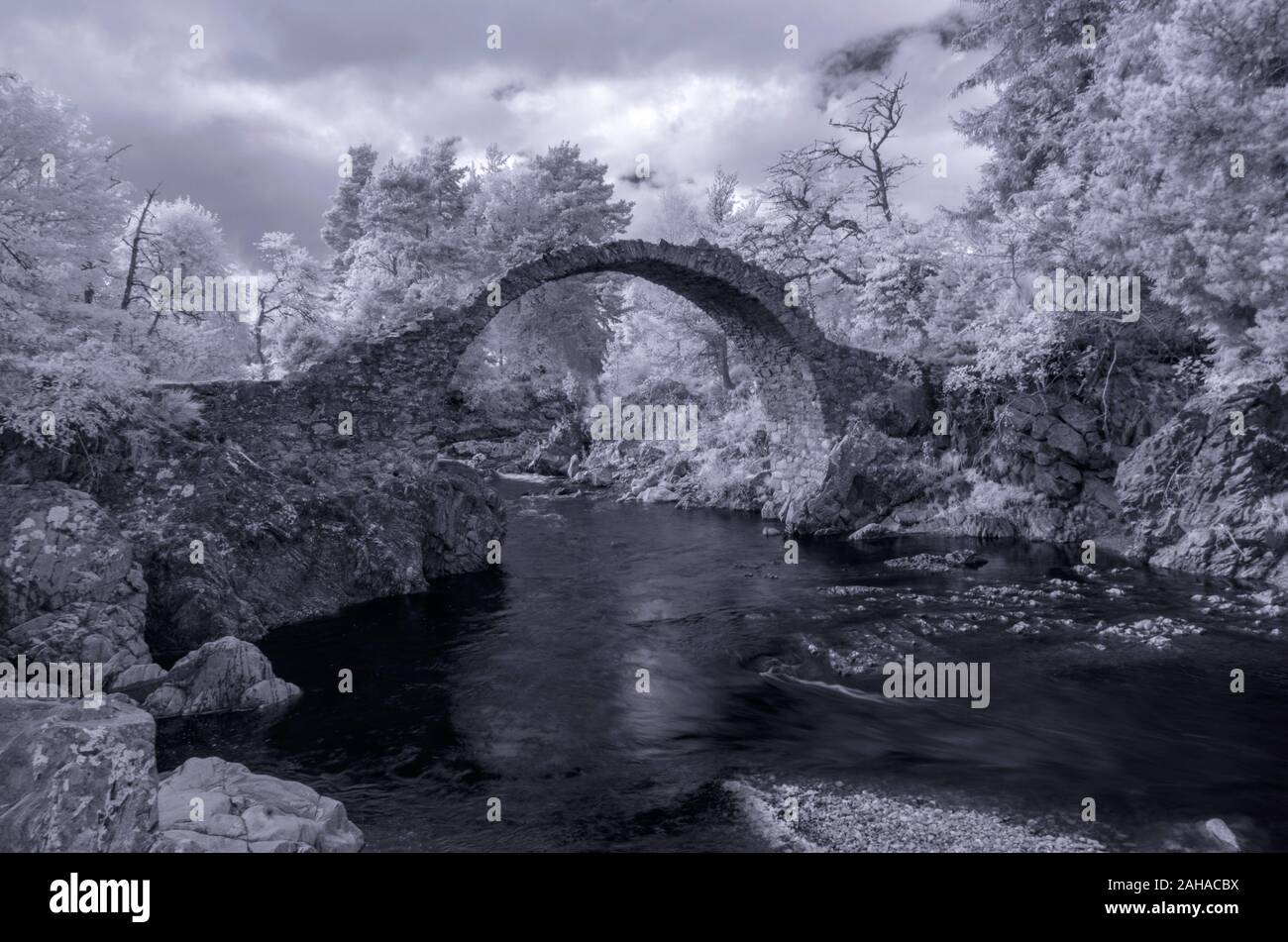 The Old Packhorse Bridge dates from 1717, Carrbridge, Cairngorms, Scotland Stock Photo