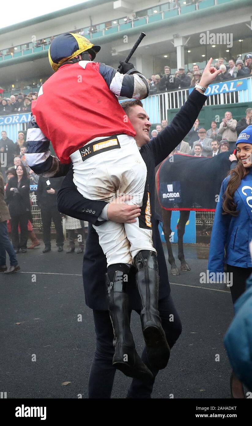 Jack Tudor celebrates with one of the connections after his victory on