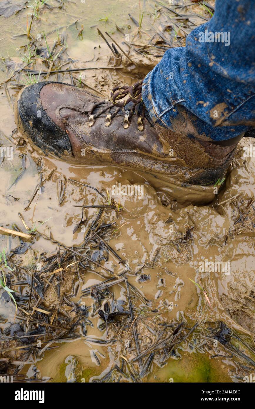 Boots stuck in mud hi-res stock photography and images - Alamy